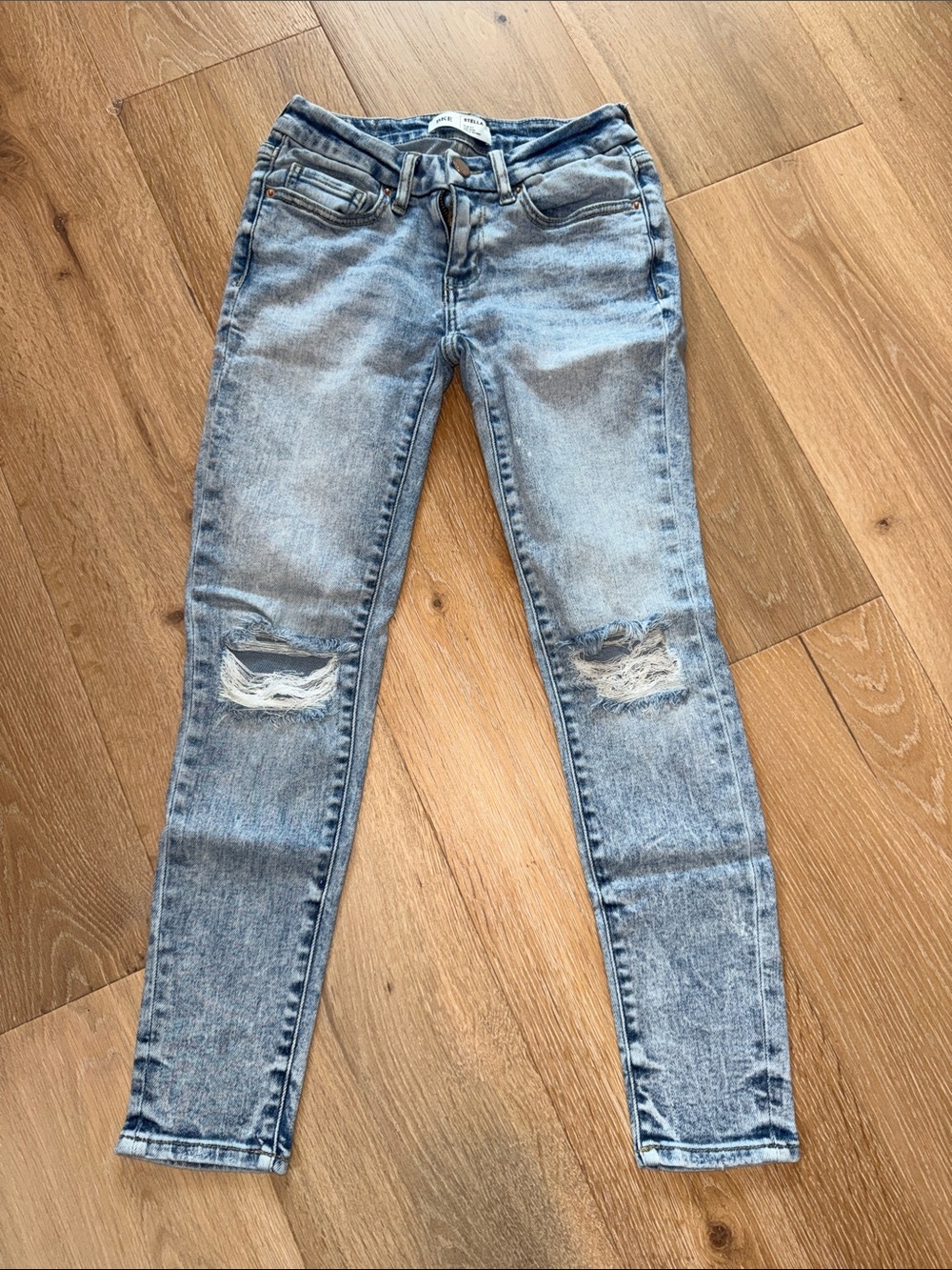 Buckle Light Blue Distressed Skinny Jeans